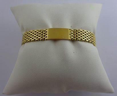 Bracelet en or jaune (750) à maille tressée...