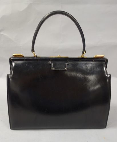 HERMES Paris


Sac de dame en box noir à...