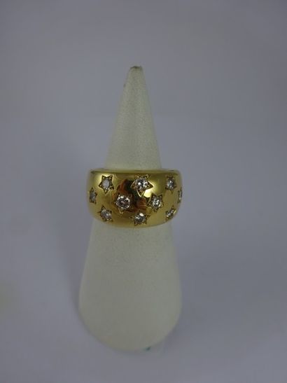 Bague jonc en or jaune (750) ornée de dix...