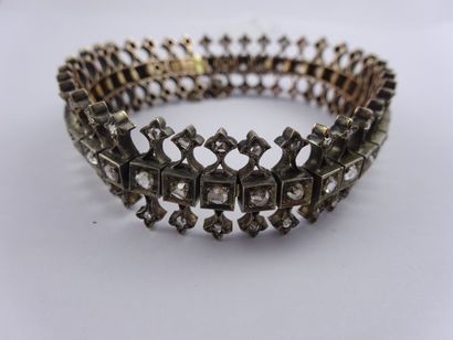 Bracelet souple en or jaune (750) et argent...