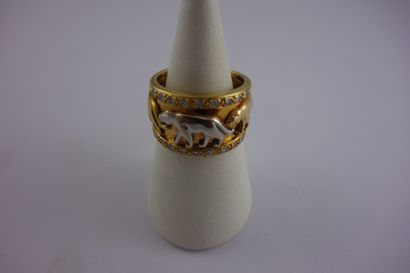 Bague jonc en ors jaune et gris (750) ornée...