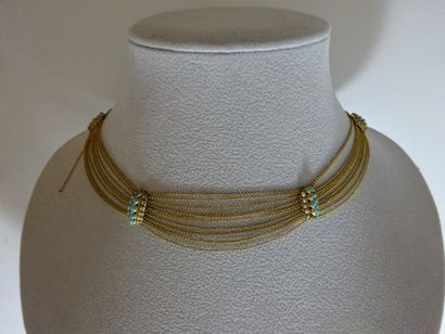 Collier ras de cou en or jaune (750) composé...