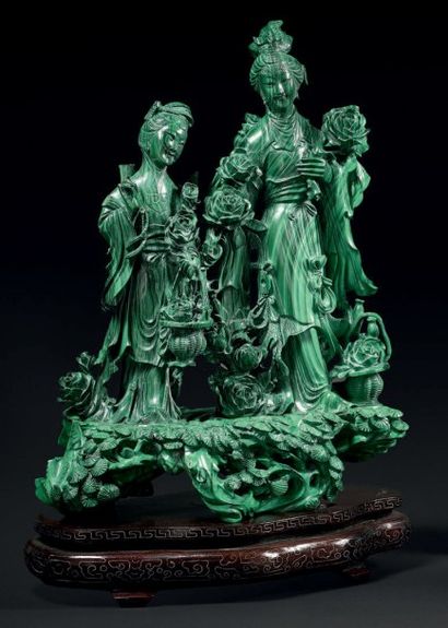 CHINE
Groupe en malachite sculptée de deux...