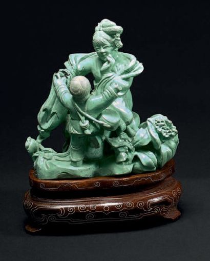 CHINE
Groupe en turquoise sculptée d'une...