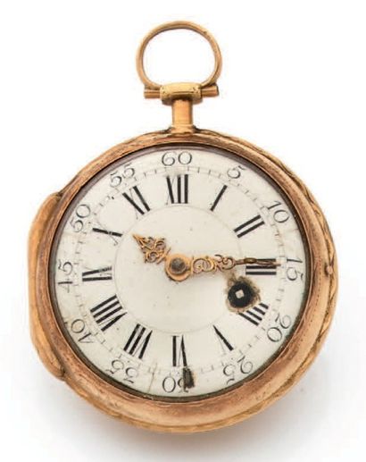 Montre de gousset en or (750 millièmes).
Cadran...