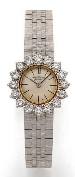 Montre bracelet de dame en or gris (750 millièmes).
Boîtier...