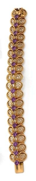 Bracelet articulé en or jaune (750 millièmes),...