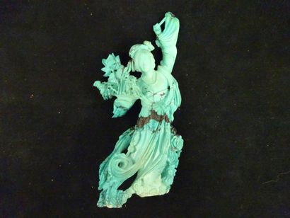CHINE

Scupture en turquoise représentant...