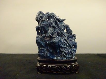CHINE

Groupe sculpté en lapis-lazuli représentant...