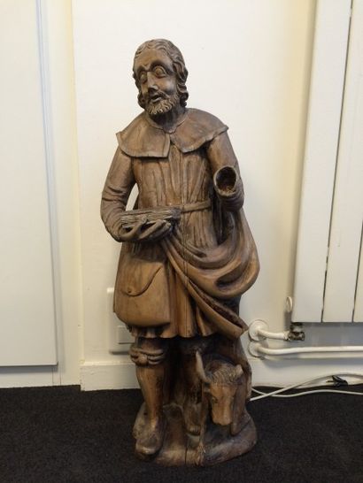 Saint Luc.

Sculpture en bois naturel anciennement...