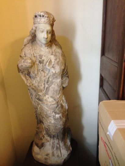 Vierge ou reine couronnée.
Sculpture en pierre...