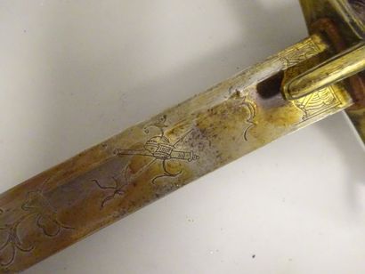 Sabre de cavalerie.

Garde en bronze à une...