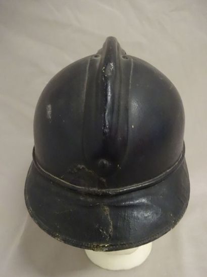 Rare casque Adrian modèle 1915.

Liège recouvert...