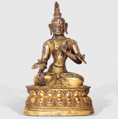Statuette de Tara en cuivre repoussé doré...