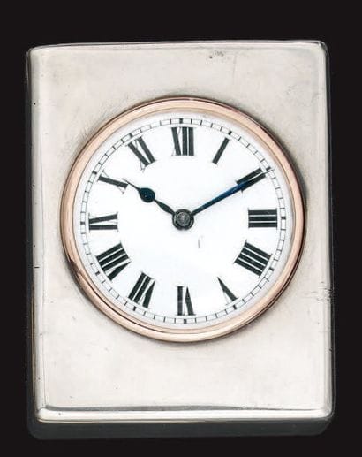 CARTIER
Pendulette de voyage en argent, cadran...