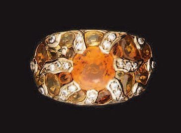 CHANEL
Bague en or, stylisant un soleil composé...