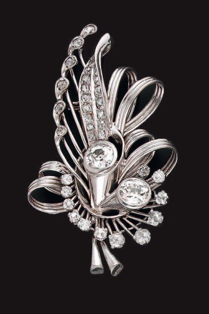 Clip de corsage en platine et or gris stylisé...