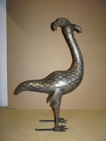 IRAN


Coq stylisé en métal avec incrustations...