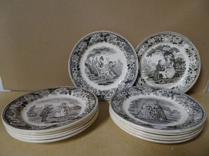 Lot de douze assiettes parlantes en faïence...