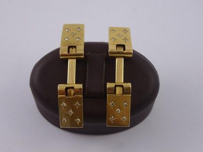 Paire de boutons de manchettes en or jaune...