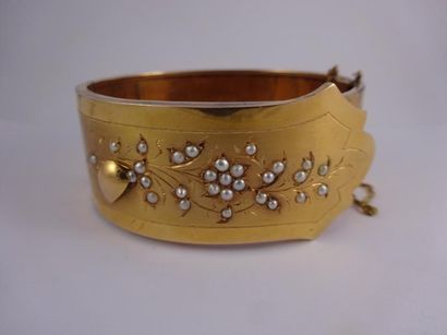Bracelet manchette ouvrant en or jaune (750)...