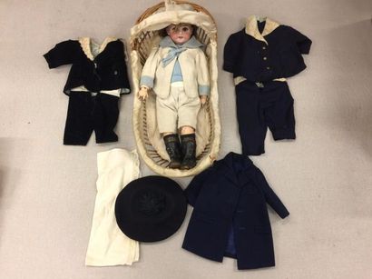 Poupée allemande.

Tête en porcelaine, bouche...