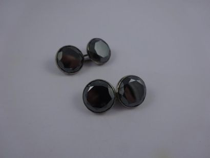 Paire de boutons de manchettes en argent...