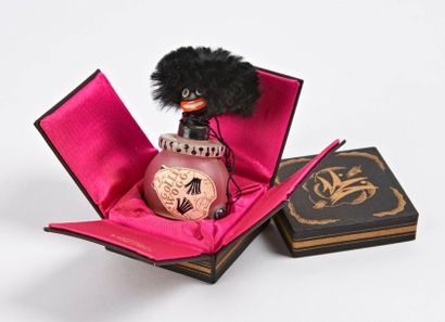 VIGNY


Golli Wogg.

Flacon (vide) en verre...