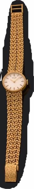 LONGINES


Montre bracelet de dame en or...