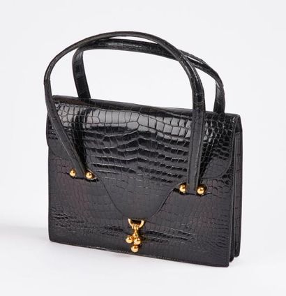 HERMES Paris


Sac à main 'Loto' en crocodile...