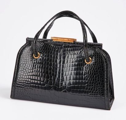 HERMES Paris


Sac à main 'Mystère' en crocodile...