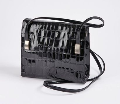LONGCHAMPS


Sac seau en cuir naturel et...