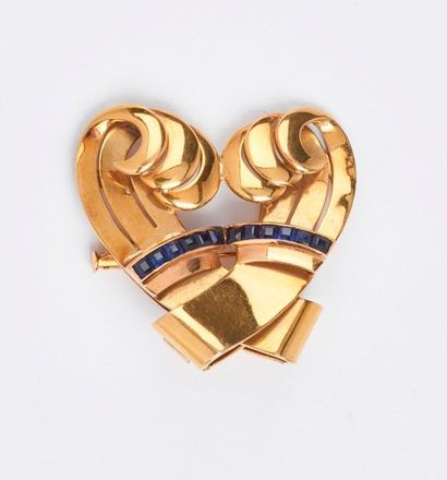 Broche en or jaune (750) formée d'une paire...