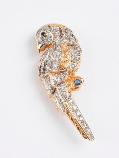 Broche en or jaune (750) figurant un perroquet...