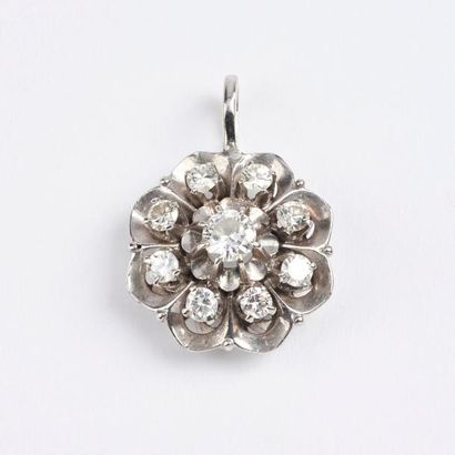 Pendentif en or gris (585) figurant une fleur,...
