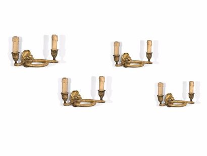 Suite de quatre appliques en bronze doré...