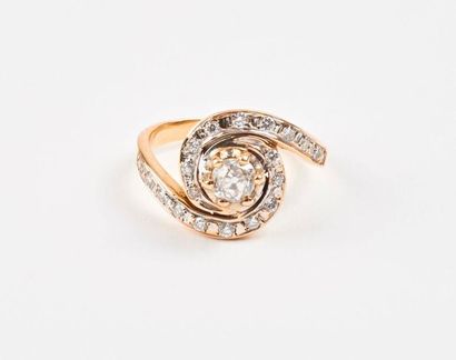 Bague tourbillon en or jaune et gris (750)...