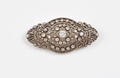 Broche en or jaune (750) et argent (800)...
