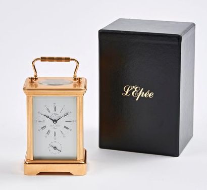 L'EPEE
Pendulette de voyage cage en bronze...