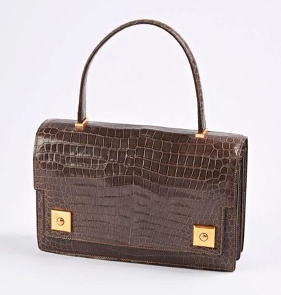 HERMES Paris, Piano


Sac en cuir de crocodile...