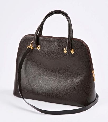 Nina RICCI


Sac de main en cuir marron grainé,...