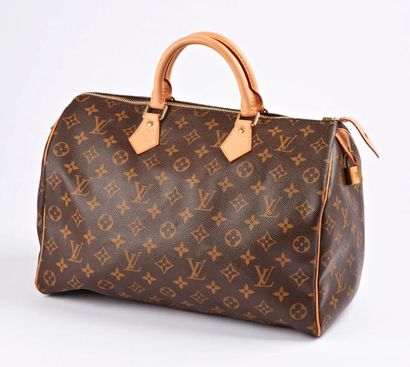 Louis VUITTON, Speedy 


Sac en toile Monogram,...