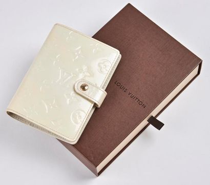 LOUIS VUITTON


Porte-agenda en cuir Monogram...