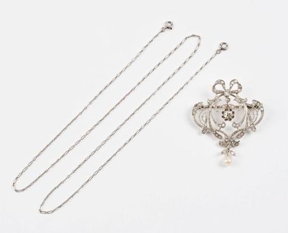 Broche pouvant former pendentif en or gris...