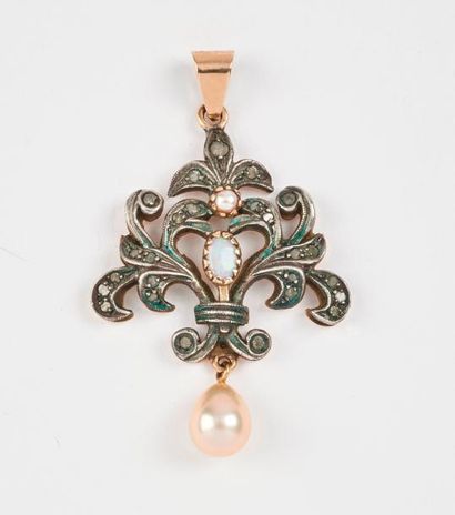 Pendentif en or jaune (750) et argent (800)...