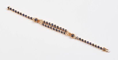 Bracelet articulé en or jaune (750) formé...