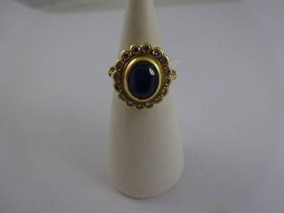 Bague marguerite en or jaune (750) centrée...