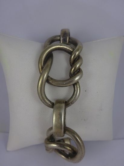 Bracelet en argent (925) formé de trois maillons...