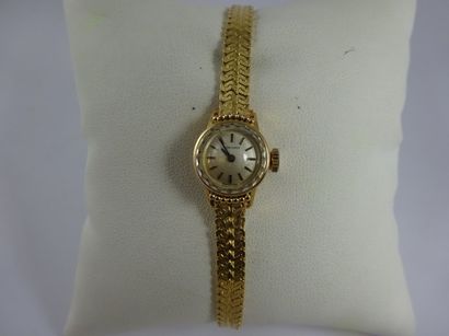 LONGINES
Montre bracelet de dame en or jaune...