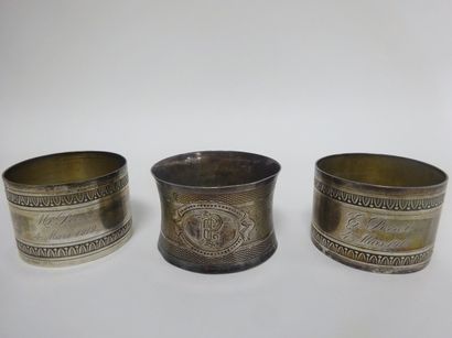 Trois ronds de serviettes en argent (950),...